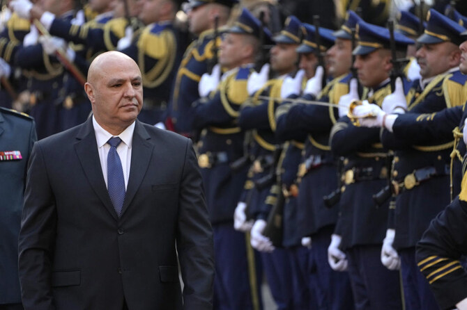 Newly-elected Lebanese President Joseph Aoun reviews the honor guard upon his arrival at the Lebanese Parliament, Jan. 9 (AP)