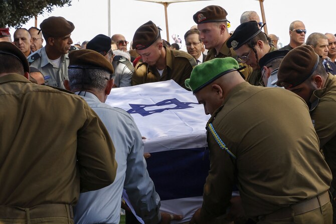 Soldiers carry the coffin of Oron Shaul during his funeral in the northern Israeli town of Poria Illit, Jan. 20 (AFP)