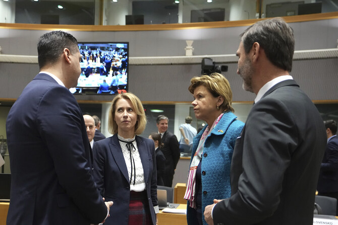 From left, Malta’s Foreign Minister Ian Borg, EU foreign policy chief Kaja Kallas, Latvia’s Foreign Minister Baiba Braze and Slovakia’s Foreign Minister Juraj Blanar speak with each other during meeting of EU foreign ministers in Brussels. (AP)