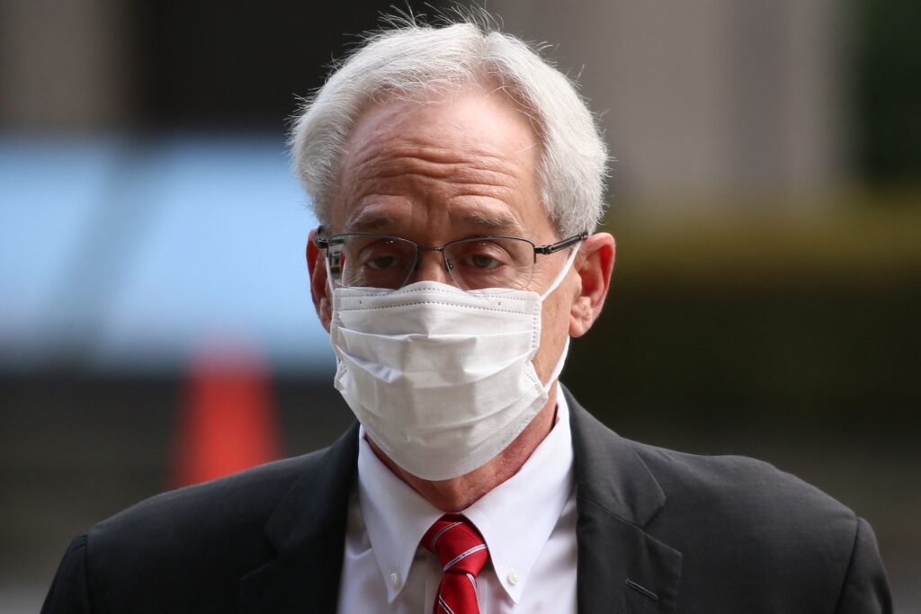 This file photo taken on March 3, 2022 shows former Nissan executive Greg Kelly arriving at the Tokyo district court to hear the verdict in his financial misconduct case in Tokyo. The Tokyo High Court is expected on February 4, 2025 to rule on an appeal in the case of the former Nissan executive. Kelly was found guilty of financial misconduct in 2022 and handed a six-month suspended sentence. (AFP)