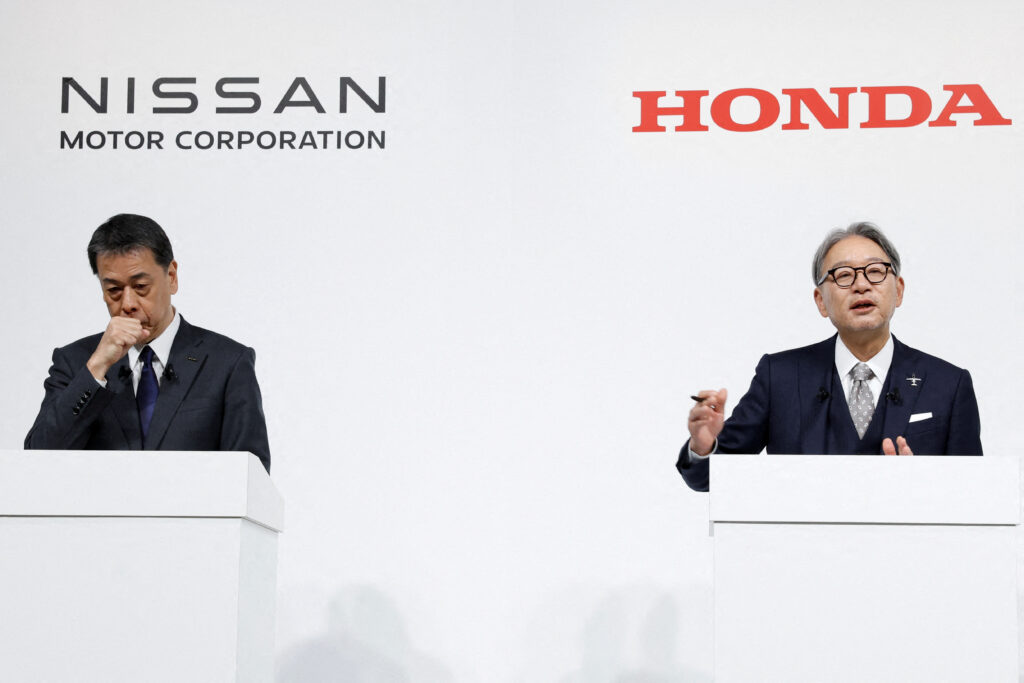 Makoto Uchida, Director, Representative Executive Officer, President and CEO of Nissan Motor Corporation and Toshihiro Mibe, Director, President and Representative Executive Officer of Honda, attend a joint press conference on their merger talks, in Tokyo, Japan, December 23, 2024. (Reuters)