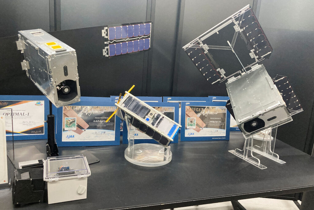 Mockups of ArkEdge Space's small satellites, including ONGLAISAT, jointly developed with the University of Tokyo's Intelligent Space Systems Laboratory and Taiwan Space Agency, are kept at the company's office in Tokyo, Japan, February 5, 2025. (REUTERS)