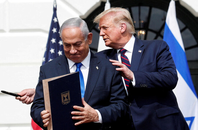 Israeli Prime Minister Benjamin Netanyahu stands with US President Donald Trump after signing the Abraham Accords, in Washington, US, September 15, 2020. (File/REUTERS)