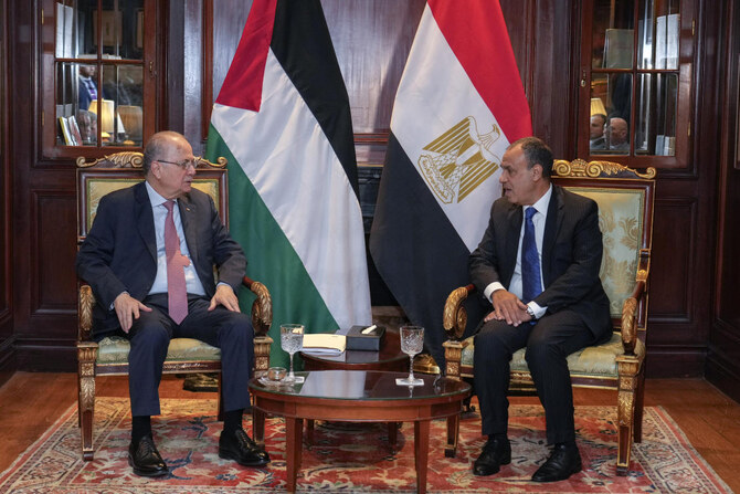 Egyptian Foreign Minister Badr Abdelatty, right, meets with Palestinian Prime Minister Mohammed Mustafa, in Cairo, Egypt, Wednesday, Feb. 5, 2025. (AP)