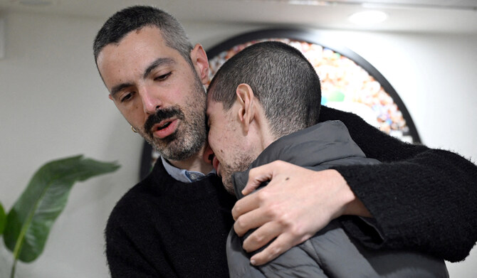 Released hostage Or Levy, who was seized during the deadly October 7, 2023 attack by Hamas, embraces a loved one as he is reunited with his family at Sheba Medical Center in Ramat Gan, Israel, in a handout photo obtained by Reuters on February 8, 2025. (REUTERS)