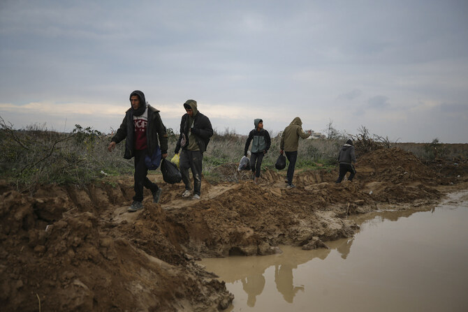Displaced Palestinians make their way from central Gaza to their homes in the northern Gaza Strip, Monday, Feb. 10, 2025. (AP)