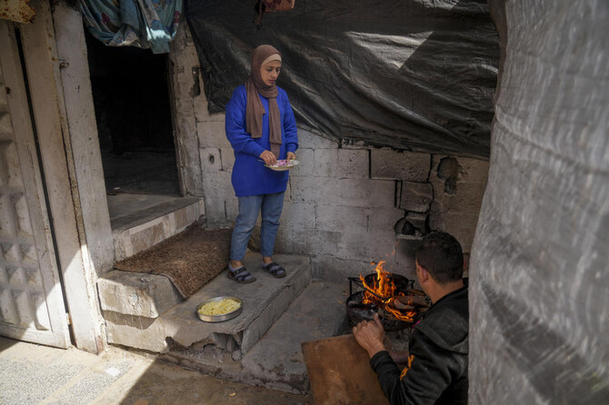 Rawya Tamboura and her family, left, are among nearly 600,000 Palestinians who flooded back into northern Gaza after a ceasefire was implemented. (AP)