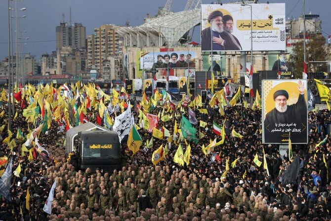 Hassan Nasrallah, Hezbollah’s founding leader, was laid to rest on Sunday. (AFP)