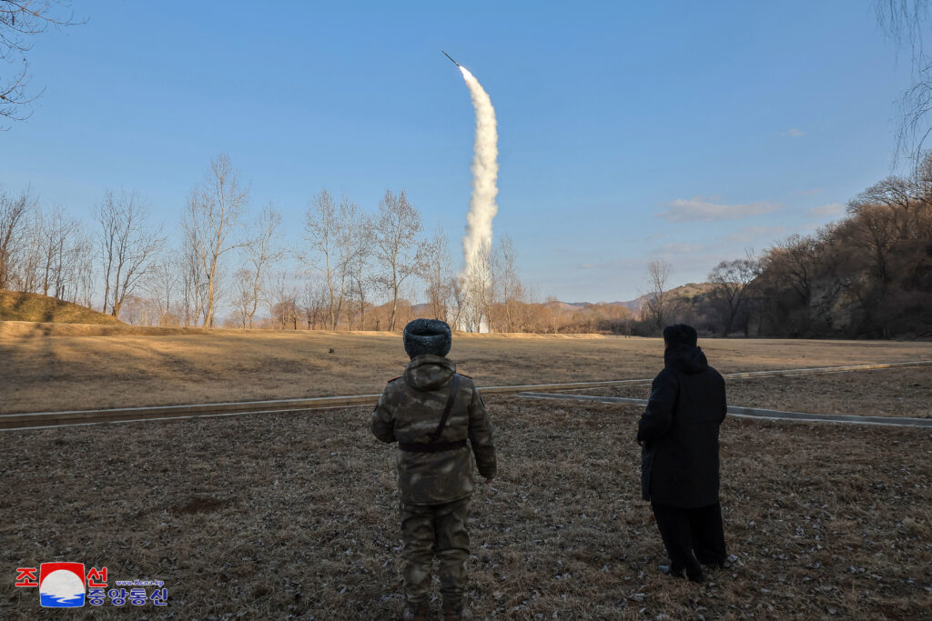 This picture taken on January 25, 2025 and released from North Korea's official Korean Central News Agency (KCNA) via KNS on January 26, 2025 shows North Korea's leader Kim Jong Un (R) overseeing the test-firing of a strategic cruise and guided weapon at sea (underwater), at an undisclosed location in North Korea. (AFP)