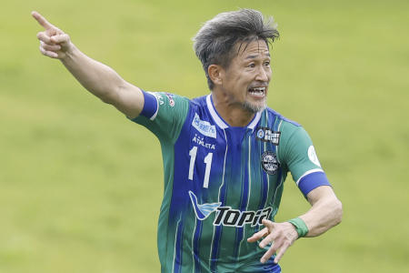 Japanese forward Kazuyoshi Miura of Suzuka competes during a JFL soccer match against Oita in Suzuka, central Japan, on July 14, 2024. (Kyodo News via AP)