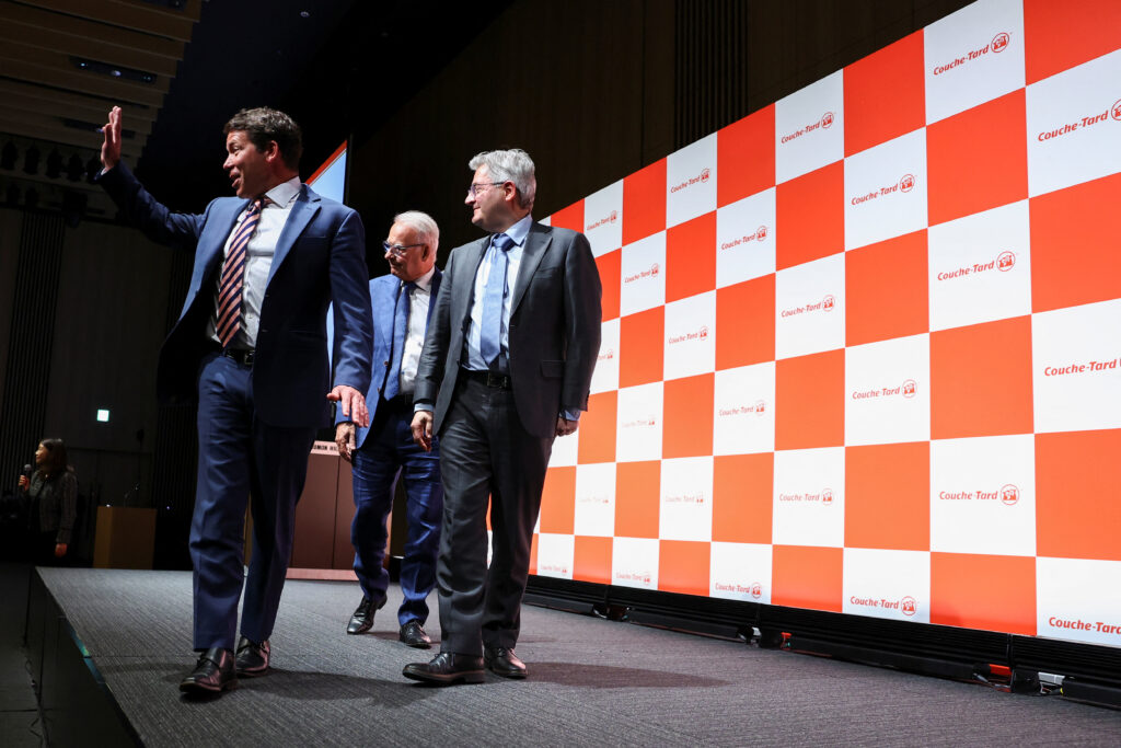 Alimentation Couche-Tard Inc.'s founder Alain Bouchard, CEO Alex Miller and CFO Filipe Da Silva attend a photo session after a press conference on their bid for 7-Eleven convenience store operator Seven & i Holdings in Tokyo, Japan, March 13, 2025. (REUTERS)