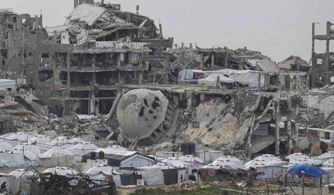A tent camp for displaced Palestinians is set up amid destroyed buildings in the west of Al-Shati camp, west of Gaza City, on Monday, March 3, 2025. (AP)