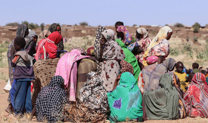 Displaced Sudanese women and children gather at a camp near the town of Tawila in North Darfur on February 11, 2025. (AFP/File)