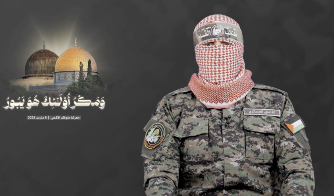 Abu Obaida, the spokesperson for the armed wing of the Palestinian militant group Hamas, talks during a recorded video statement released on Thursday. (Screengrab) 