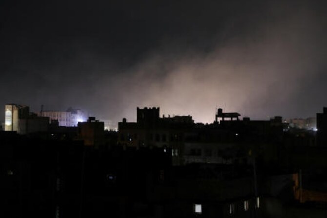 Dust rises from the site of strikes in Sanaa, Yemen March 15, 2025. (Reuters)