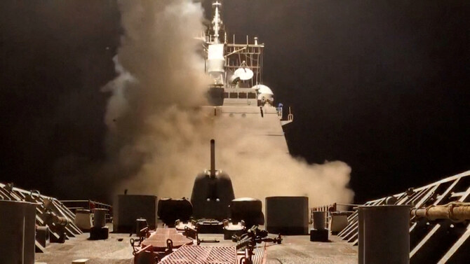 A ship fires missiles at an undisclosed location, after US President Donald Trump launched military strikes against Yemen's Iran-aligned Houthis on Saturday over the group's attacks against Red Sea shipping. (Reuters via US Central Command)