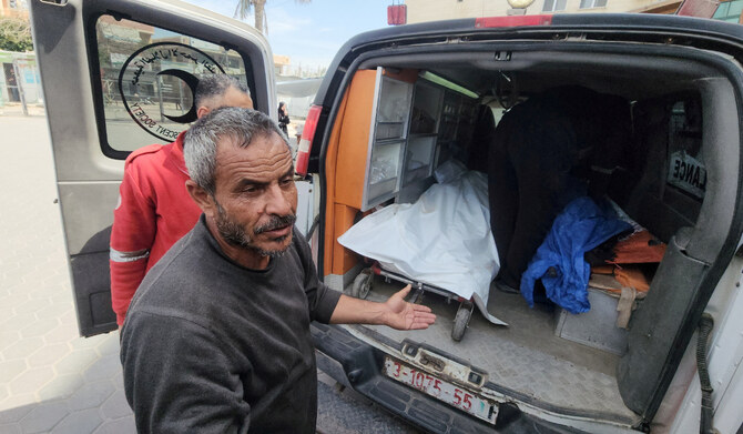 A mourner reacts next to the bodies of Palestinians, killed in an Israeli strike, according to medics, at Al-Aqsa Martyrs hospital in Deir Al-Balah in the central Gaza Strip March 17, 2025. (REUTERS)