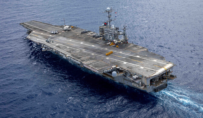 In this handout image provided by the US NAVY the Nimitz-class aircraft carrier USS Harry S. Truman (CVN 75) transits the Atlantic Ocean during an ordnance transfer, August 24, 2024. (AFP)
