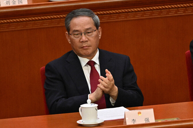 China's Premier Li Qiang attends the closing session of the National People's Congress (NPC) at the Great Hall of the People in Beijing on March 11, 2025. (AFP)