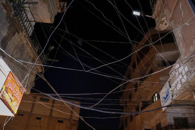 Neighborhoods in most parts of the country turn pitch black once the sunsets, save on some lights from street lamps, Mosque minarets, and drivers with their floodlights on to see.(AP)