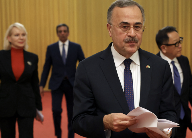 Aramco CEO Amin Nasser leaves the meeting room where global business leaders met with Chinese President Xi Jinping, at the Great Hall of the People in Beijing, China. Reuters
