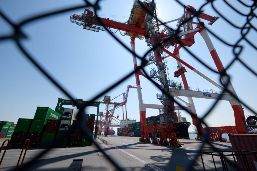 Japan's exports have surged in recent months as businesses rushed to send overseas shipments before Trump’s tariffs kick in. (AFP)