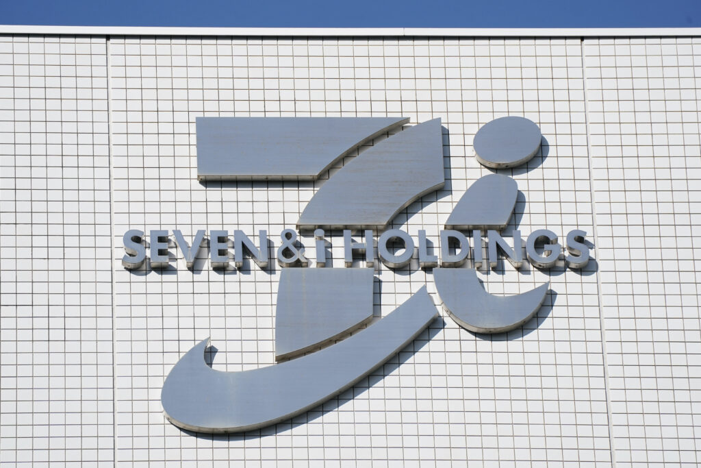 The logo of Seven & I Holdings is displayed on the wall of the company's headquarters building in Tokyo on January 9, 2025. (AFP)