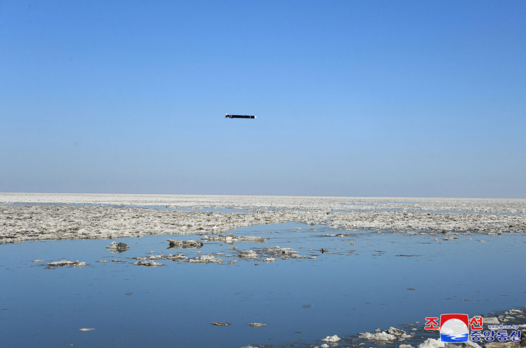 This picture taken on February 26, 2025 and released from North Korea's official Korean Central News Agency (KCNA) via KNS on February 28, 2025 shows a strategic cruise missile during a drill by the Korean People's Army, on the coast of the