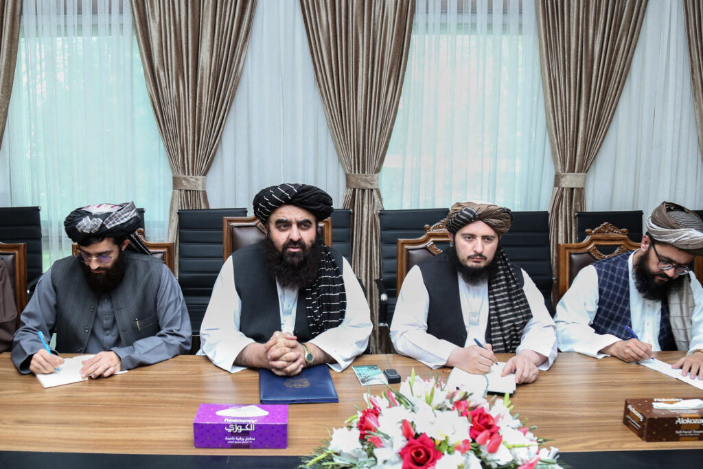 This handout photograph taken and released by Afghanistan's Ministry of Foreign Affairs on March 20, 2025 shows Taliban foreign minister Amir Khan Muttaqi (2L) attending a meeting with US official Adam Boehler (unseen) and former US envoy to Afghanistan Zalmay Khalilzad (unseen), in Kabul. (AFP)