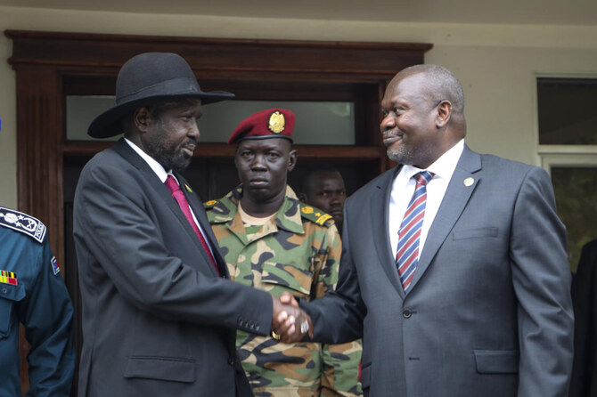 South Sudan’s president Salva Kiir and vice president Riek Machar shake hands after meetings in Juba, South Sudan, on Oct. 20, 2019, to discuss outstanding issues to the peace deal. (AP/File)