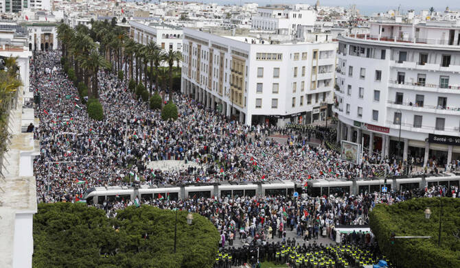 Moroccan security forces deploy as people attend a national march in support of Palestinians and against the kingdom's normalisation of ties with Israel, in the capital Rabat on April 6, 2025. (AFP)