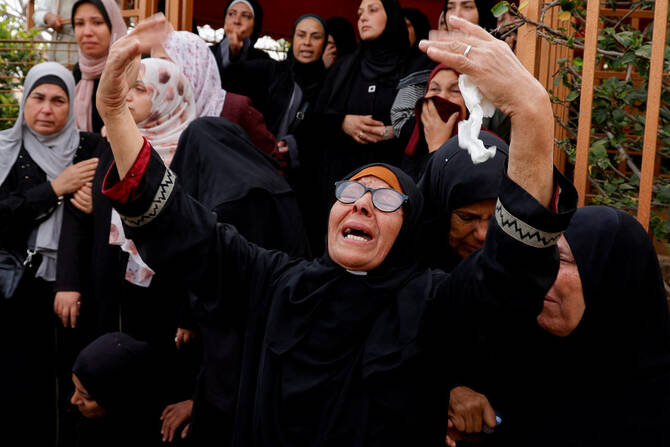 Women mourn Palestinians killed in Israeli strikes in Khan Younis in the southern Gaza Strip on April 9, 2025. (Reuters)