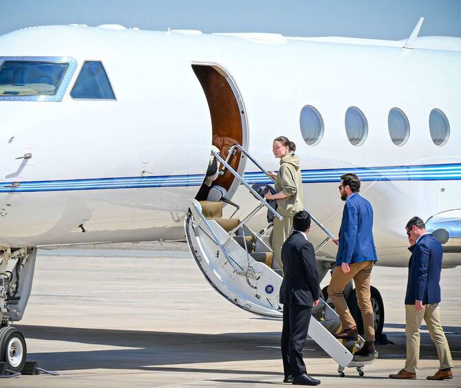 US-Russian dual national Ksenia Karelina getting on a private jet after her release at an airport in Abu Dhabi, UAE. (WAM)