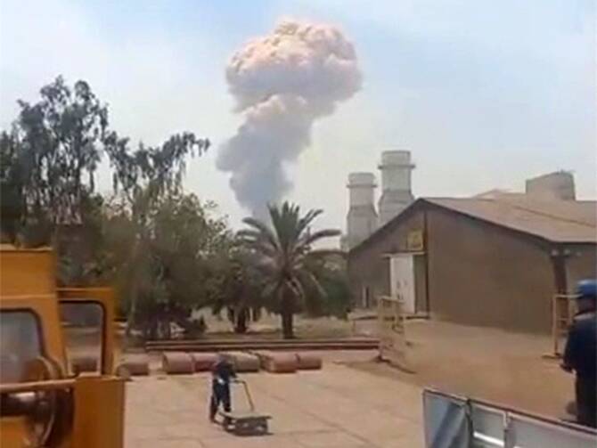 This image grab taken from footage released by the state television Islamic Republic of Iran Broadcasting News (IRIBNEWS) on April 26, 2025 shows smoke billowing following an explosion at the Shahid Rajaee port dock southwest of Bandar Abbas in the Iranian province of Hormozgan. (AFP)