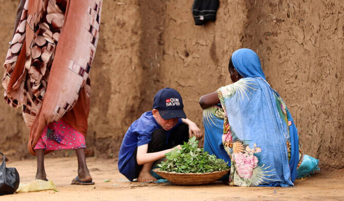 Displaced Sudanese people sit at Zamzam camp, in North Darfur, Sudan, August 1, 2024. (Reuters/File)