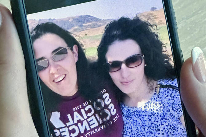 In this 2018 selfie image provided by Emma Tsurkov, right, she and her sister Elizabeth Tsurkov are shown in Santa Clara Valley, California (AP/File)