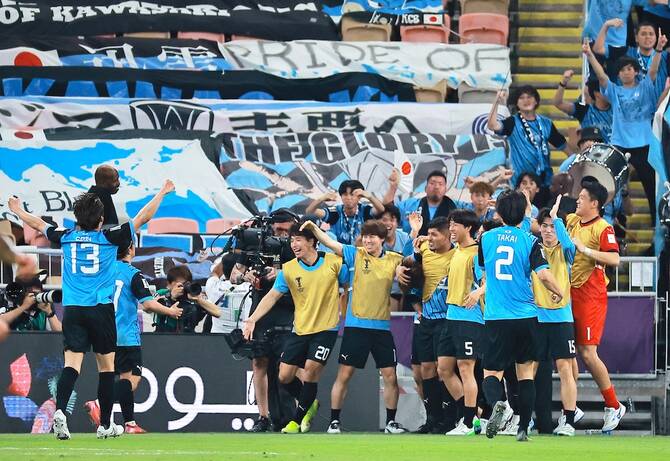 Kawasaki Frontale’s Yuto Ozeki, left, celebrates scoring their second goal against Al-Nassr. (Reuters)