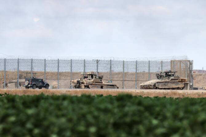 Israeli armoured vehicles take position on Israel's border with the Gaza Srip on May 4, 2025. (File/AFP)