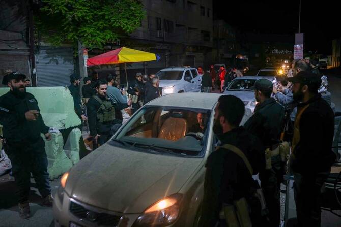 The violence in Jaramana spread south to villages in Suweida province resulting in the deaths of least 100 people in the course of a week. (AFP)