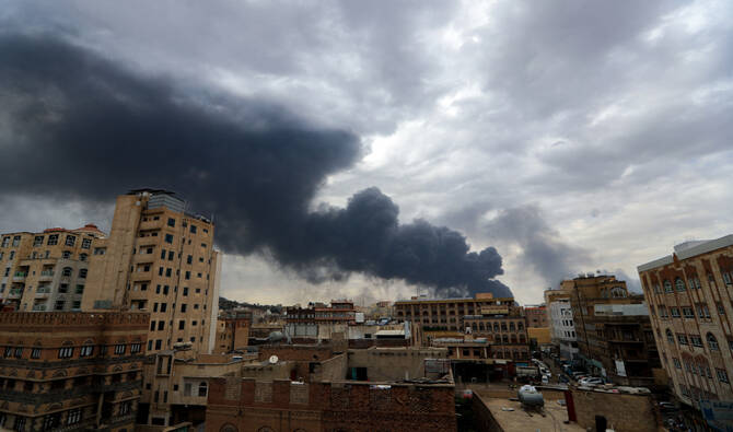 Smoke billows on the horizon following an Israeli air strike on Yemen's Houthi-held capital Sanaa on May 6, 2025. (AFP)