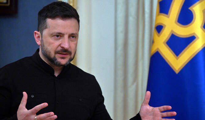 Ukraine's President Volodymyr Zelensky speaks to the media during a press briefing after his phone talks with the US president, in Kyiv, on May 19, 2025. (AFP)