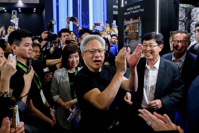 Foxconn Chairman Young Liu and Nvidia's CEO Jensen Huang. (Reuters)