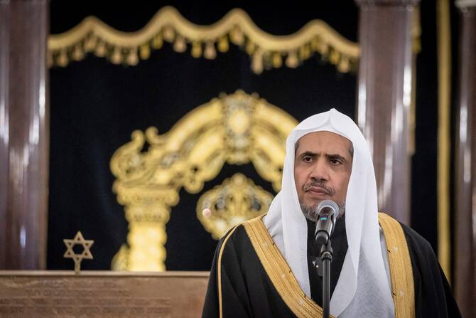 Secretary General of the Muslim World League Mohammad Abdulkarim al-Issa gives a speech during a visit to the Nozyk Synagogue on January 24, 2020 in Warsaw. (File/AFP)