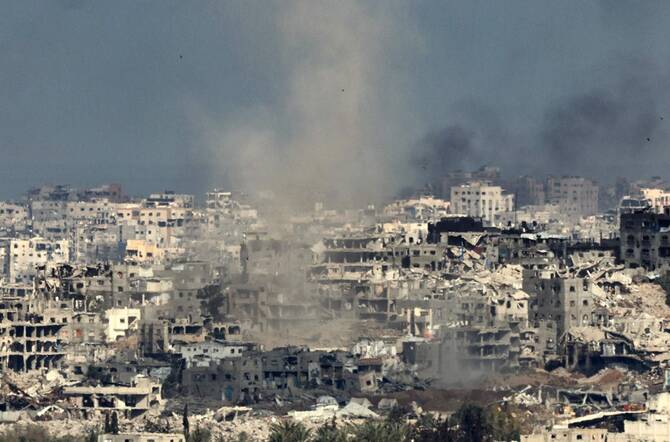 This picture taken from a position in southern Israel on the border with the Gaza Strip shows smoke billowing in Gaza during Israeli bombardment on May 20, 2025. (AFP)