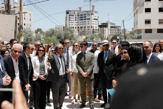 Members of a diplomatic delegation near Jenin in the occupied West Bank where they came under fire from Israeli soldiers on Wednesday. (AFP)