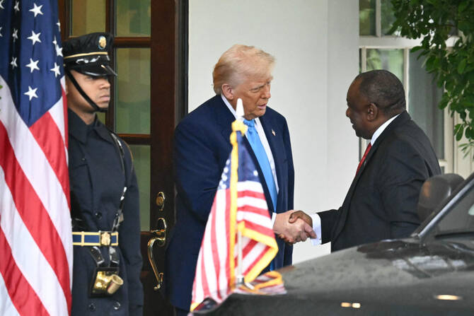 US President Donald Trump greets South African President Cyril Ramaphosa to the White House in Washington, DC, on May 21, 2025. (AFP)