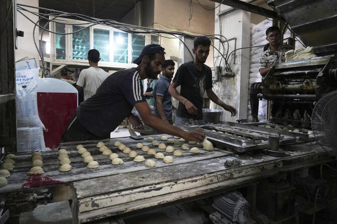 World Food Program was able to bring in flour for the first time in over a month as Israel allowed some aid to enter the Gaza Strip. (AP)