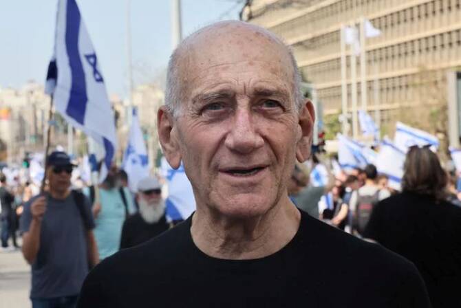 Former Israeli Prime Minister Ehud Olmert, seen here at a March 2023 demonstration in Tel Aviv, wrote an op-ed condemning his country for committing ‘war crimes’ in Gaza. (Getty Images)