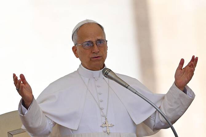 Pope Leo XIV blesses to the crowd during the weekly general audience at St Peter's Square at the Vatican on May 28, 2025. (AFP)