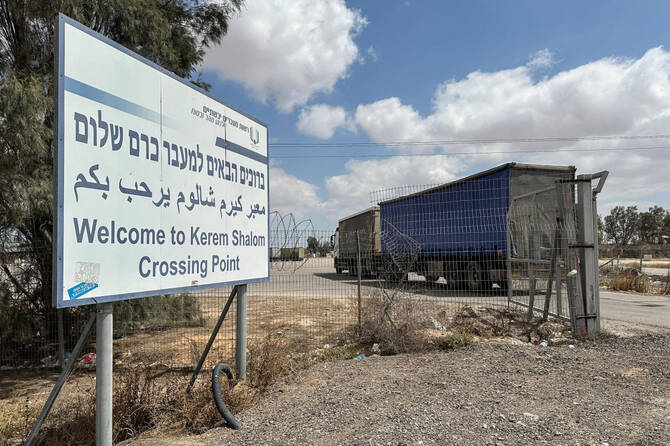 A truck carrying aid arrives at the Kerem Shalom crossing between Israel and Gaza, on its Israeli side on May 28, 2025. (Reuters)